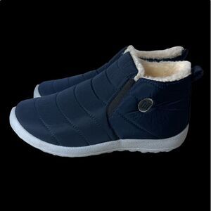NWOT BN faux Sherpa lined quilted slip on sneakers